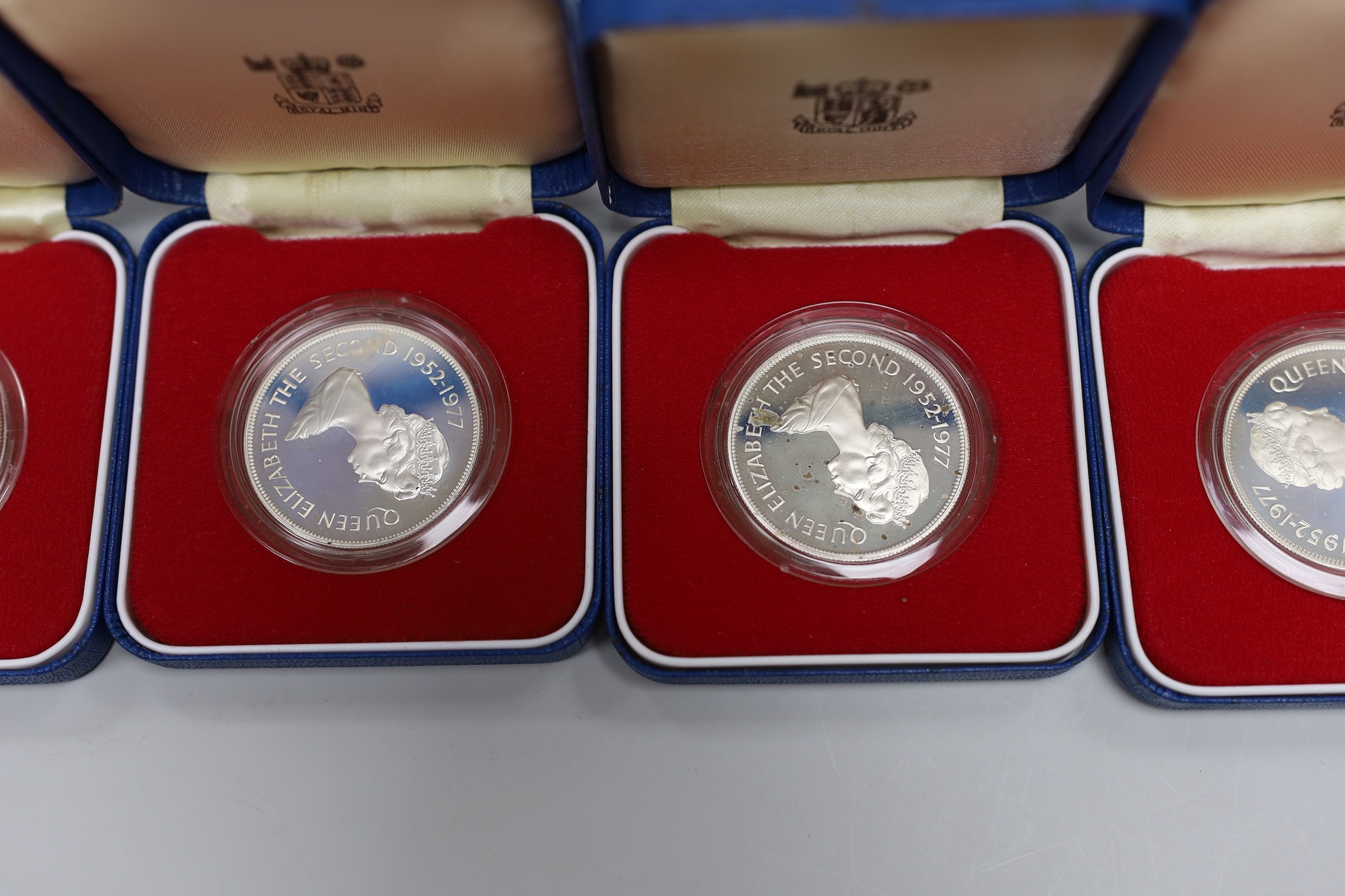 Eight Royal Mint Commonwealth commemorative proof silver crowns